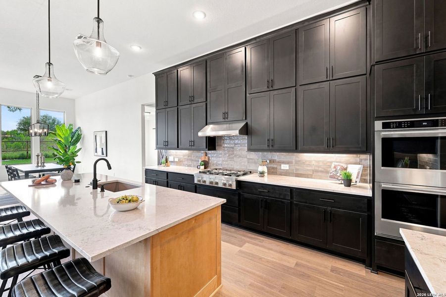 Furnished interior view inside a new home in Shavano Highlands, San Antonio (Image 27).