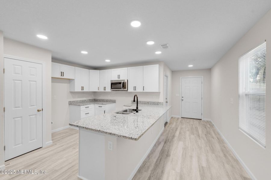 Furnished interior view inside a new home in , Jacksonville (Image 8).