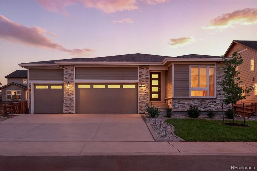 Front exterior of a new home in Creekside Village, Thornton, CO, highlighting curb appeal (Image 28).