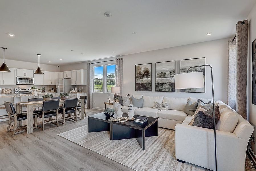 A living room with a large window.