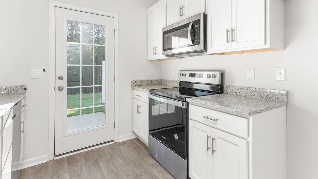 Furnished interior view inside a new home in Henley Ridge, Graham (Image 6).
