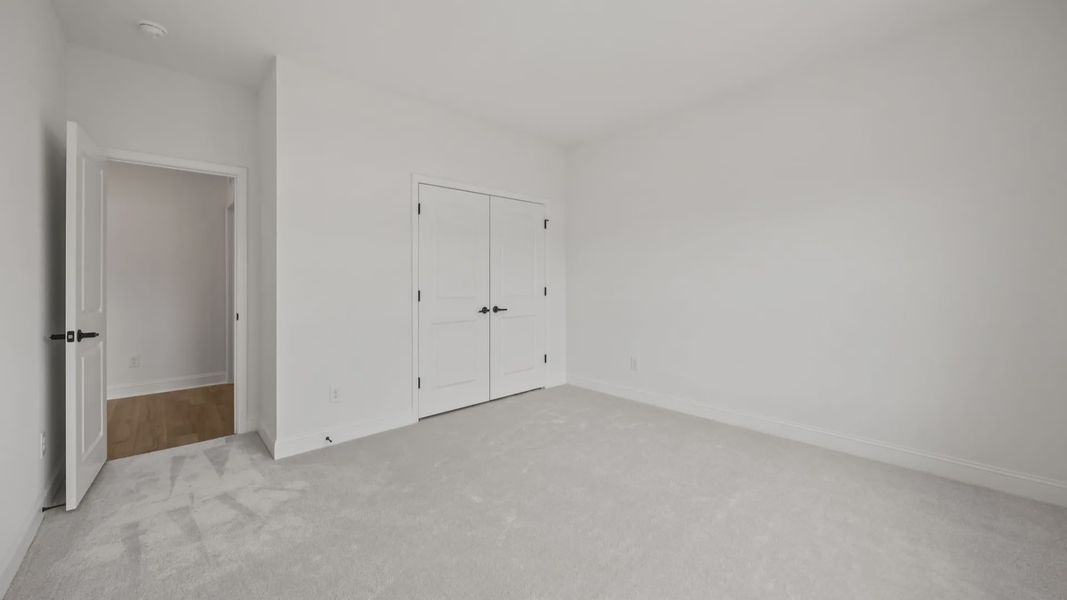 The Brentwood Plan by DRB Homes in River District, Charlotte NC.- Bedroom The Brentwood Plan by DRB Homes in River District, Charlotte NC.- Bedroom