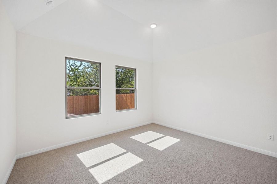 Primary Bedroom in the Cypress home plan by Trophy Signature Homes - REPRESENTATIVE PHOTO