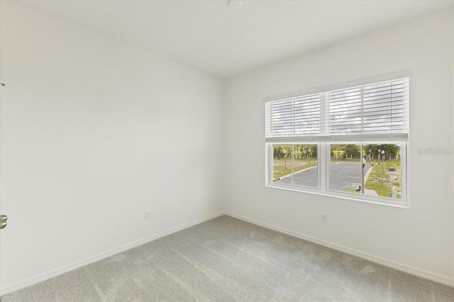 Spacious, unfurnished interior of a new home in The Residences at Emerson Park, Apopka (Image 11).