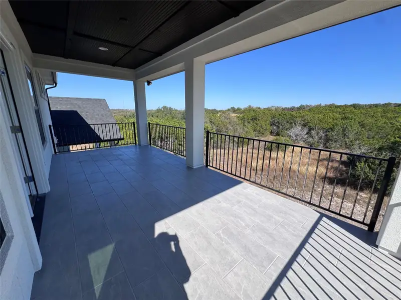Exterior details and patio area of a home in ClearWater Ranch, Liberty Hill (Image 3).