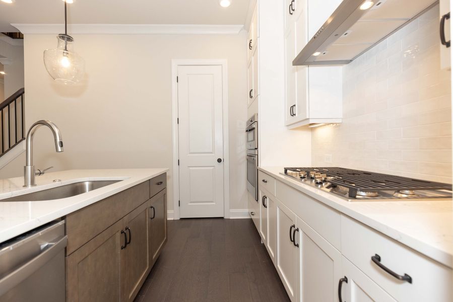 Representative furnished interior of a home built from the The Tensley by The Providence Group in Waterhaven, Cumming (Image 9).