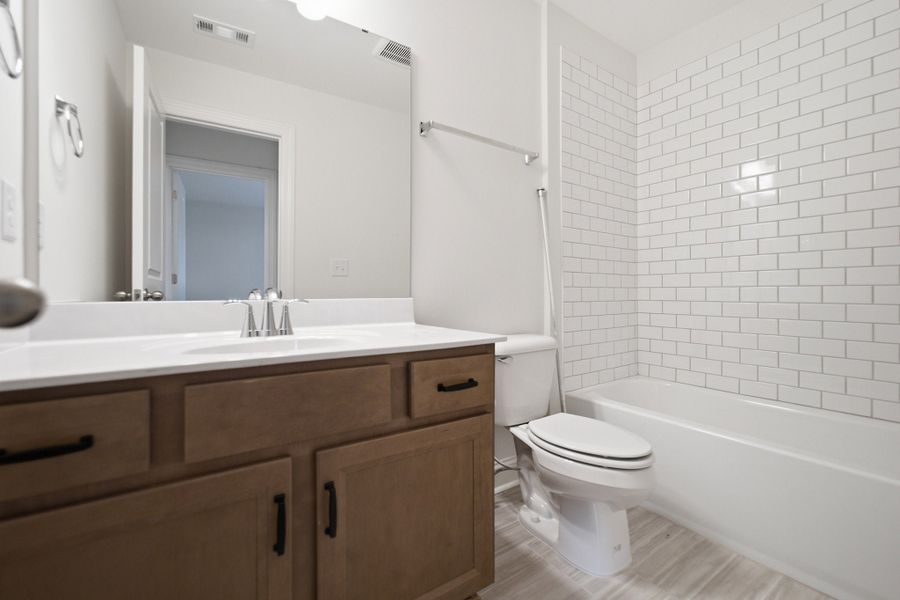 Furnished interior view inside a new home in Dorris Farm, White House (Image 13).