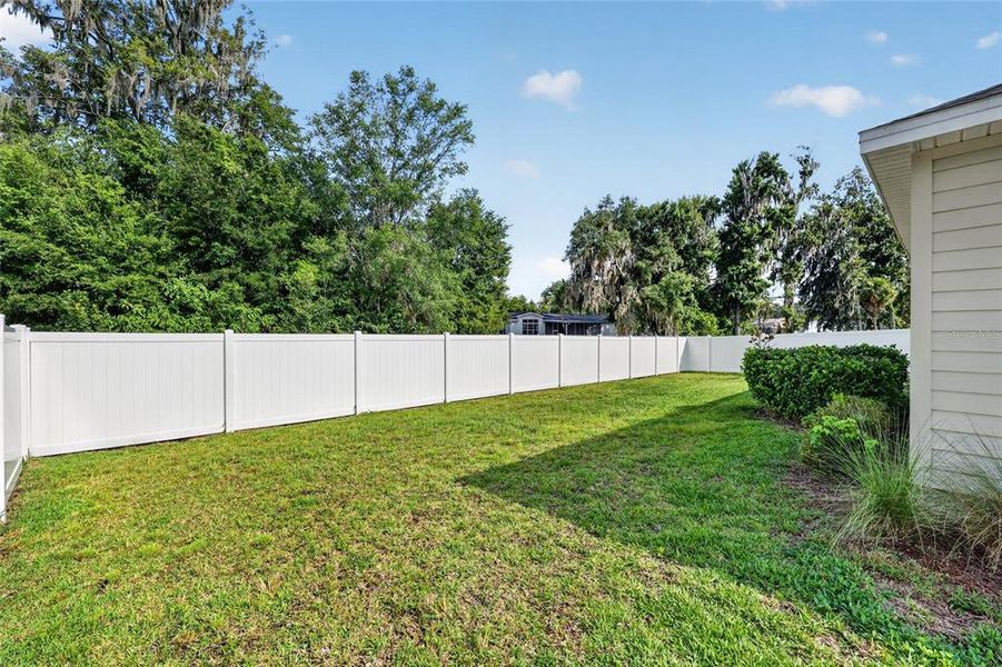 Exterior details and patio area of a home in Heath Preserve, Ocala (Image 32).