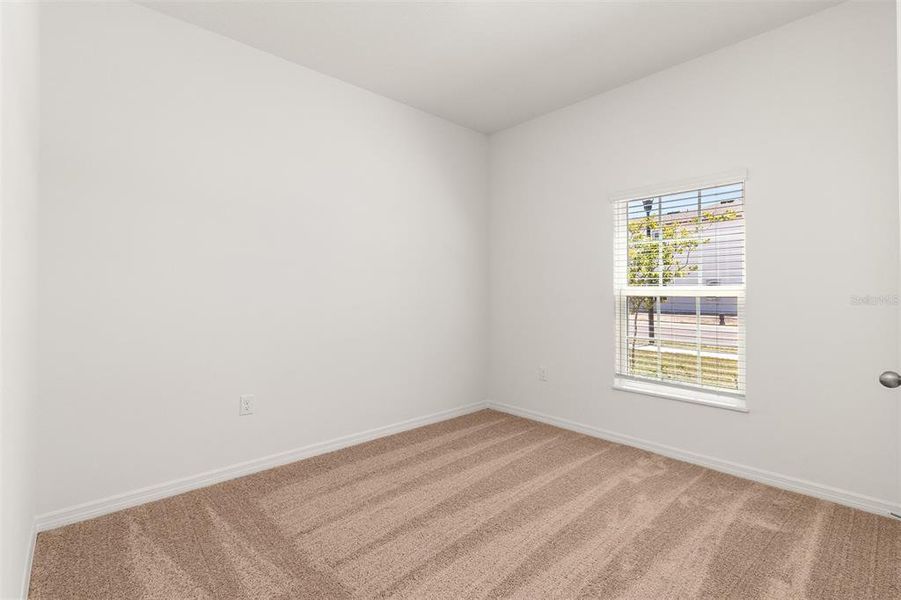 Spacious, unfurnished interior of a new home in Peach Crossings, Winter Haven (Image 12).