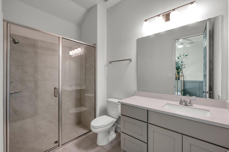 Secondary bathroom with walk in shower. Secondary bathroom with walk in shower.