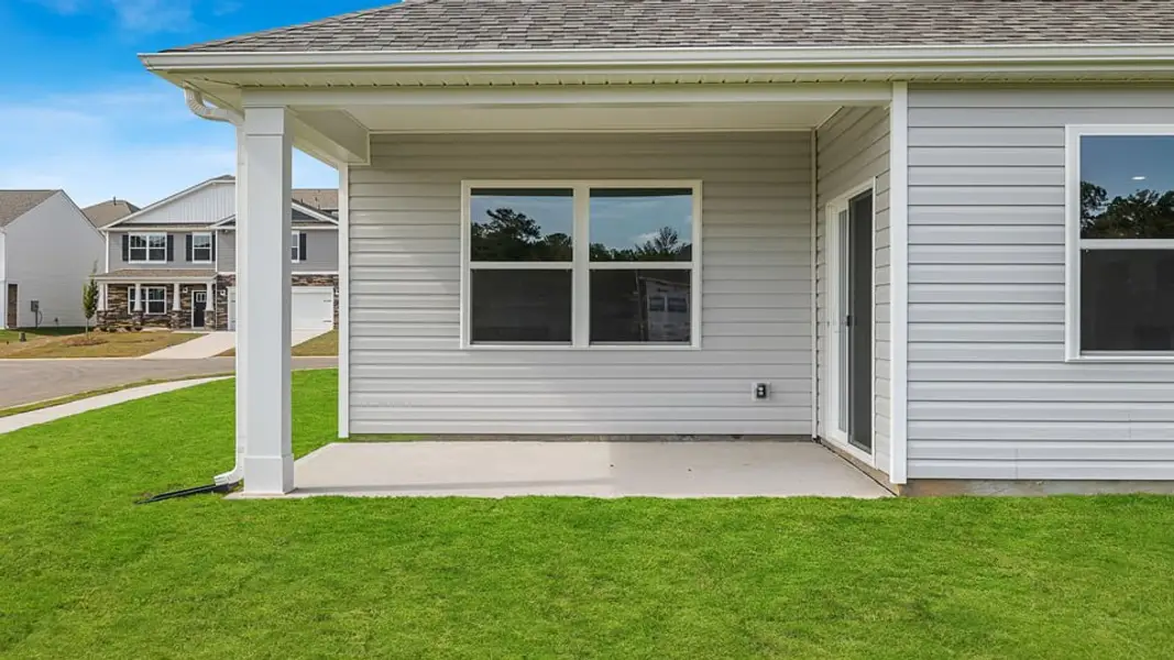 Exterior details and patio area of a home in Sage Grove, Lyman (Image 3).