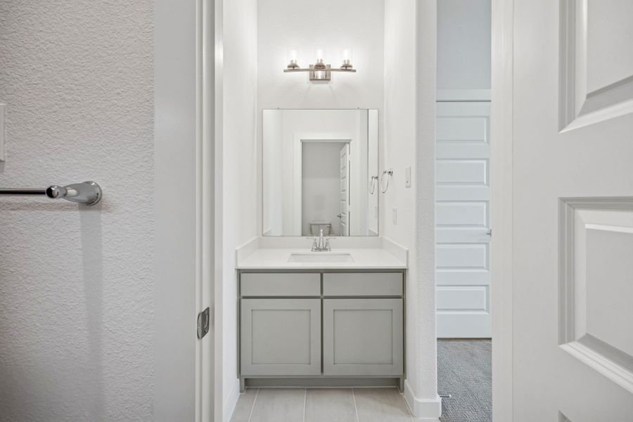 Bathroom in the Gilmour II home plan by Trophy Signature Homes – REPRESENTATIVE PHOTO