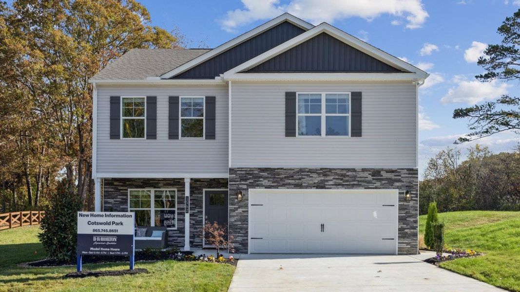 Front exterior of a new home in The Hideaway at Fox Meadows, Bluff City, TN, highlighting curb appeal (Image 19). Front exterior of a new home in The Hideaway at Fox Meadows, Bluff City, TN, highlighting curb appeal (Image 19).