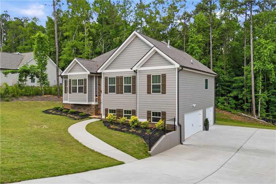 Front exterior of a new home in , Douglasville, GA, highlighting curb appeal (Image 29).