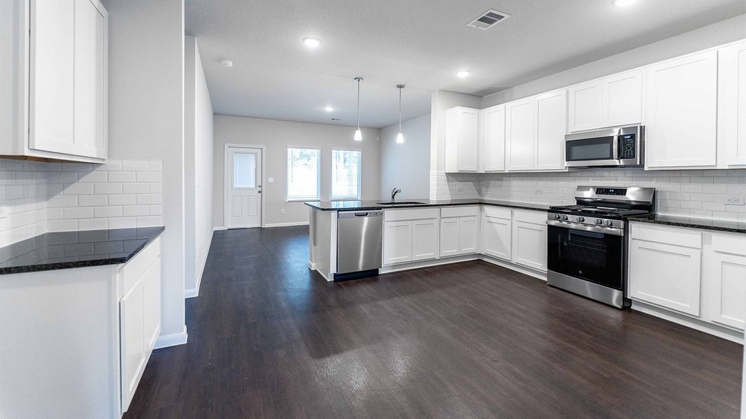 Furnished interior view inside a new home in The Canopies, Splendora (Image 4).