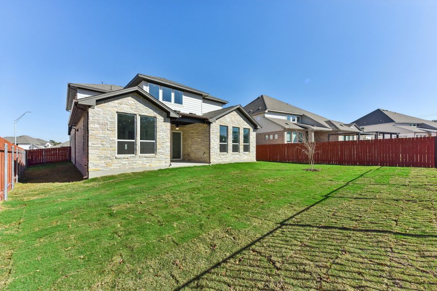 Exterior details and patio area of a home in Sauls Ranch, Round Rock (Image 18).