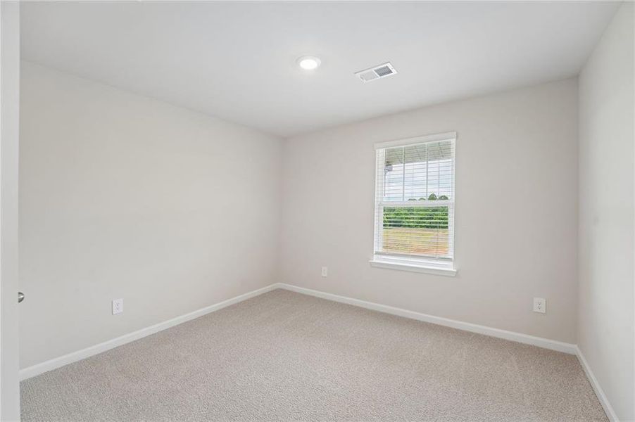 Spacious, unfurnished interior of a new home in Hemingway - Highland Series, Cumming (Image 43).