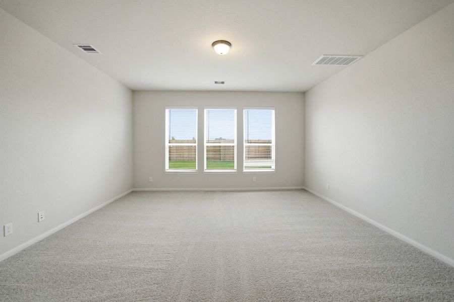 Spacious, unfurnished interior of a new home in Wildrye, Waller (Image 42).