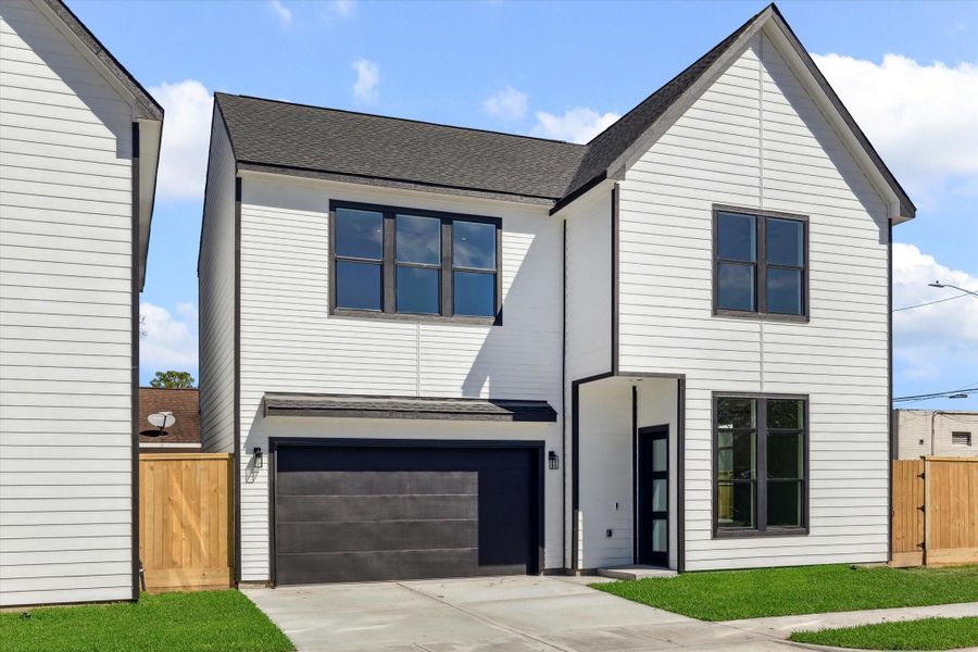 Front exterior of a new home in , Houston, TX, highlighting curb appeal (Image 17).
