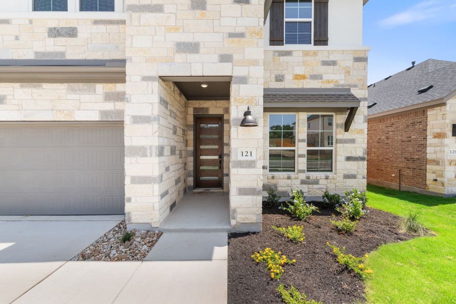 Exterior details and patio area of a home in Heritage, Dripping Springs (Image 3).