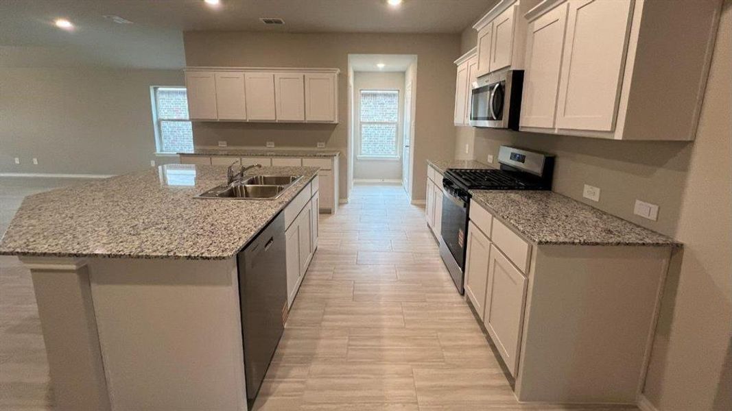 Furnished interior view inside a new home in Rosewood at Beltmill, Fort Worth (Image 7).