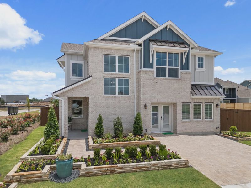 Representative exterior photo of a completed home built from the Dillon by Chesmar Homes in Meridiana Courtyard Collection, Manvel, TX (Image 16).
