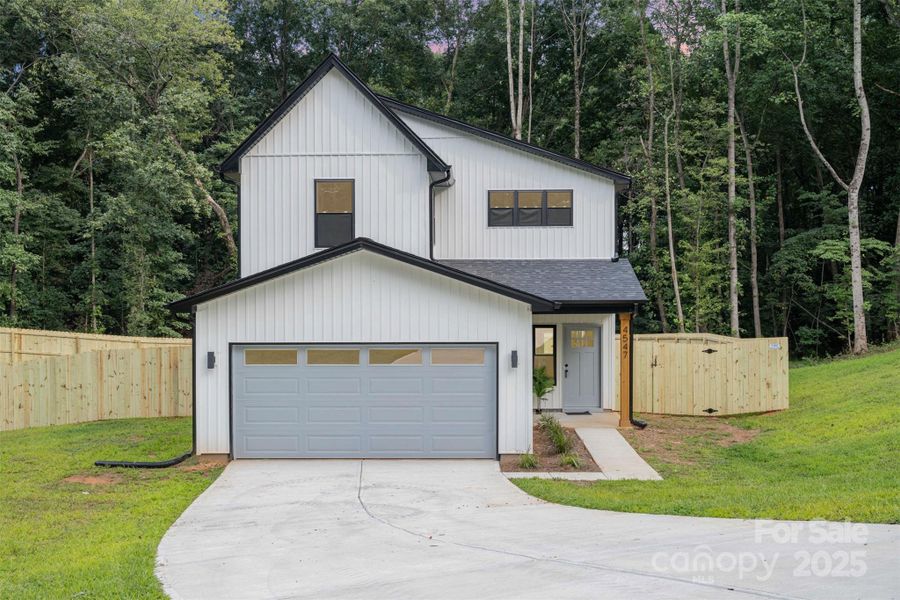 Front exterior of a new home in , Hickory, NC, highlighting curb appeal (Image 28).