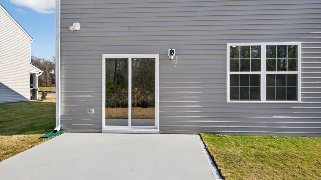 Exterior details and patio area of a home in Lawson Glen, Clayton (Image 3). Exterior details and patio area of a home in Lawson Glen, Clayton (Image 3).