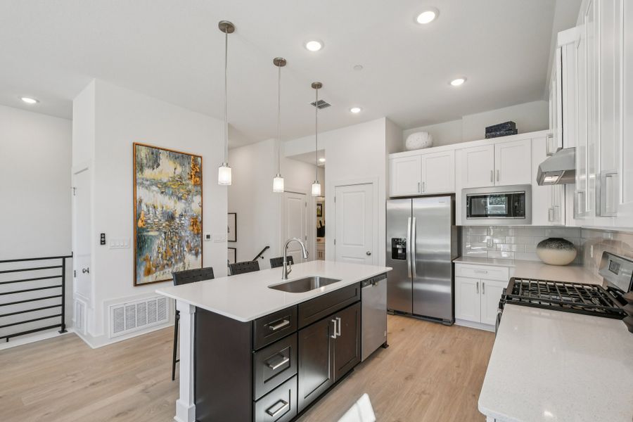 Furnished interior view inside a new home in Koenig Townhomes, Austin (Image 4).