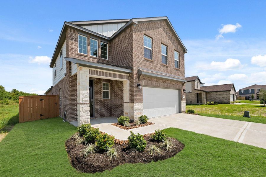 Front exterior of a new home in River Ranch Trails, Dayton, TX, highlighting curb appeal (Image 2). Front exterior of a new home in River Ranch Trails, Dayton, TX, highlighting curb appeal (Image 2).