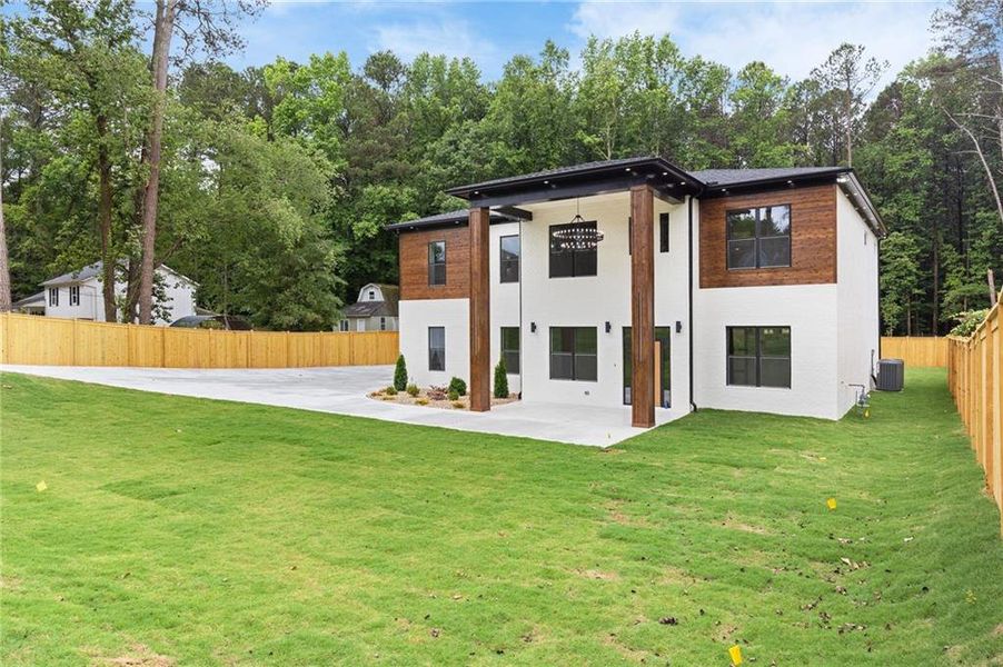 Front exterior of a new home in , Lilburn, GA, highlighting curb appeal (Image 29).