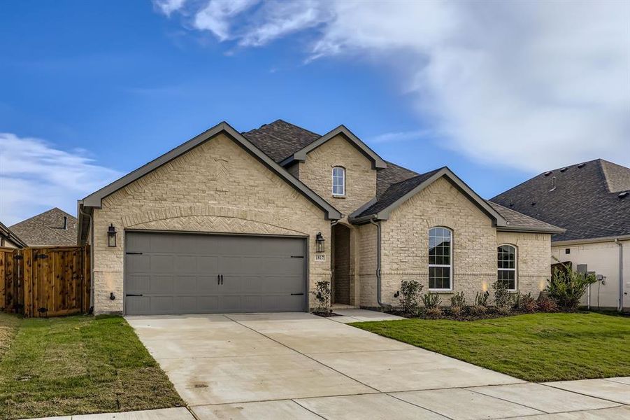 Front exterior of a new home in M3 Ranch 60s, Mansfield, TX, highlighting curb appeal (Image 2).