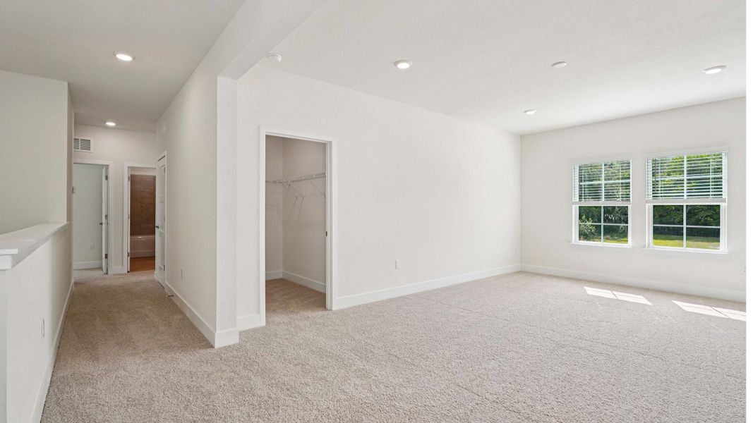 Representative unfurnished interior of a home built from the Hemingway by D.R. Horton in Buchanan Trails, Newberry (Image 25).
