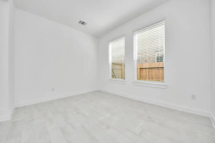 Make memories gathered around the table with your family and friends! This spacious dining room features elegant flooring, custom paint, and adjacent to family room and kitchen for open concept feel.