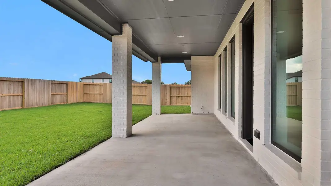 Exterior details and patio area of a home in Sienna, Missouri City (Image 3). Exterior details and patio area of a home in Sienna, Missouri City (Image 3).