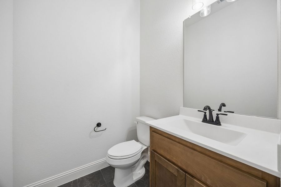 Furnished interior view inside a new home in Country Lakes, Denton (Image 13).