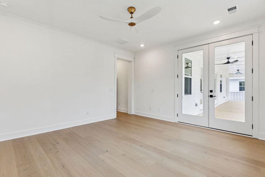 Spacious, unfurnished interior of a new home in Overlook at Copahee Sound, Awendaw (Image 28).