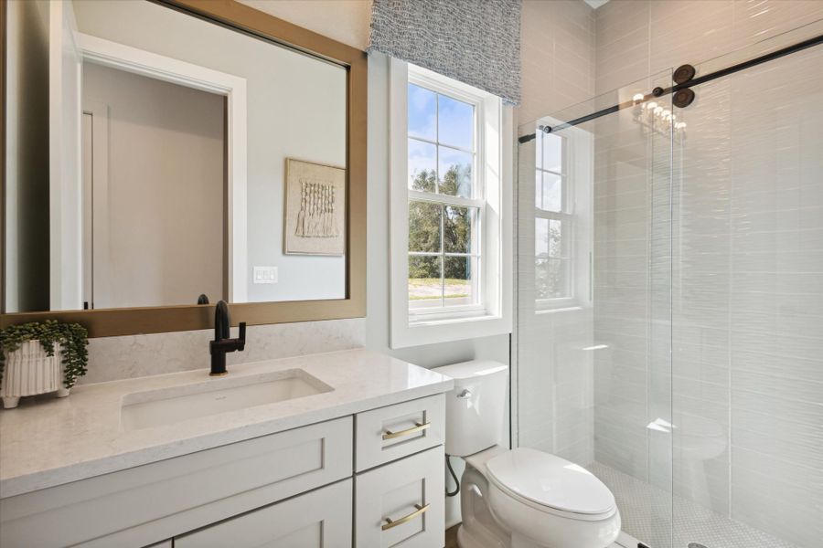 Representative furnished interior of a home built from the Cedar Key II by Homes by WestBay in Oakfield, Parrish (Image 10).