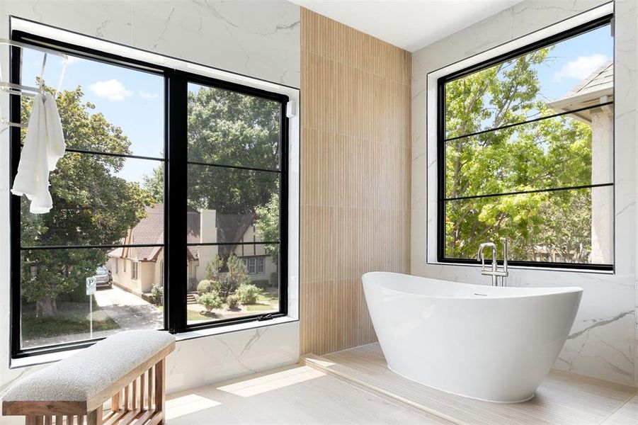 Bathroom with tile patterned flooring and tile walls