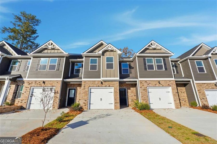 Front exterior of a new home in Carolina, Palmetto, GA, highlighting curb appeal (Image 2). Front exterior of a new home in Carolina, Palmetto, GA, highlighting curb appeal (Image 2).