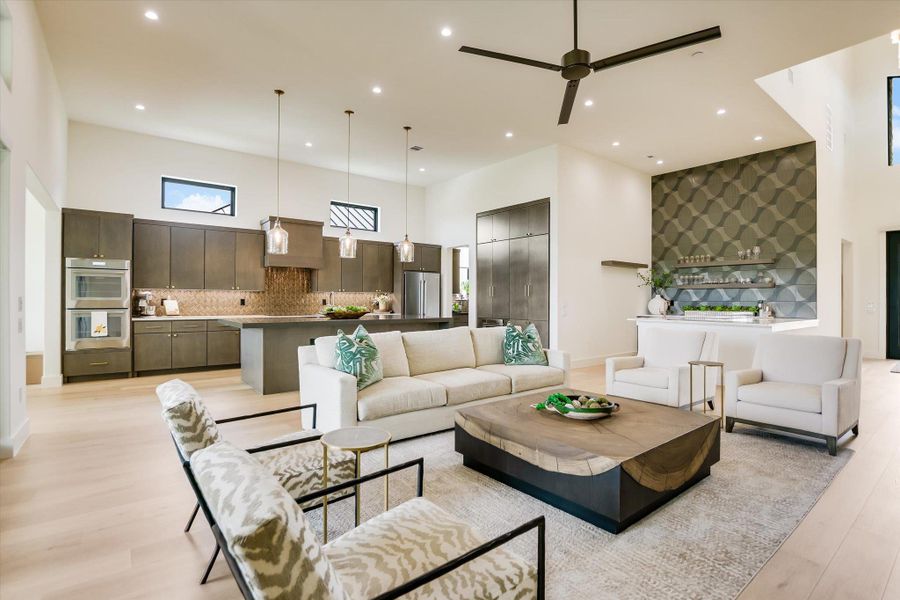 Discover a spacious open-concept interior combining a chef's kitchen with an inviting living area.
