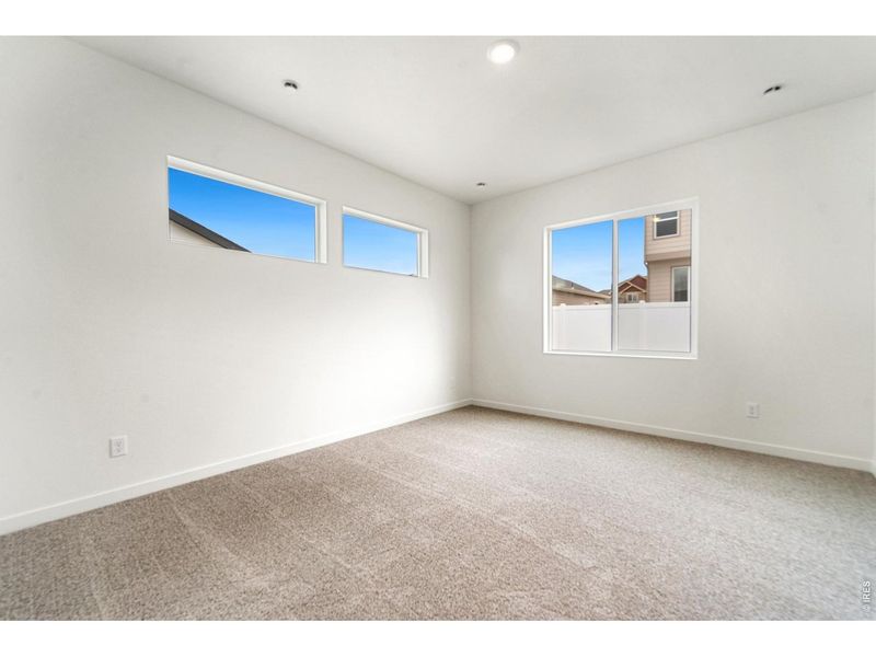 Spacious, unfurnished interior of a new home in Union Colony West, Greeley (Image 14).