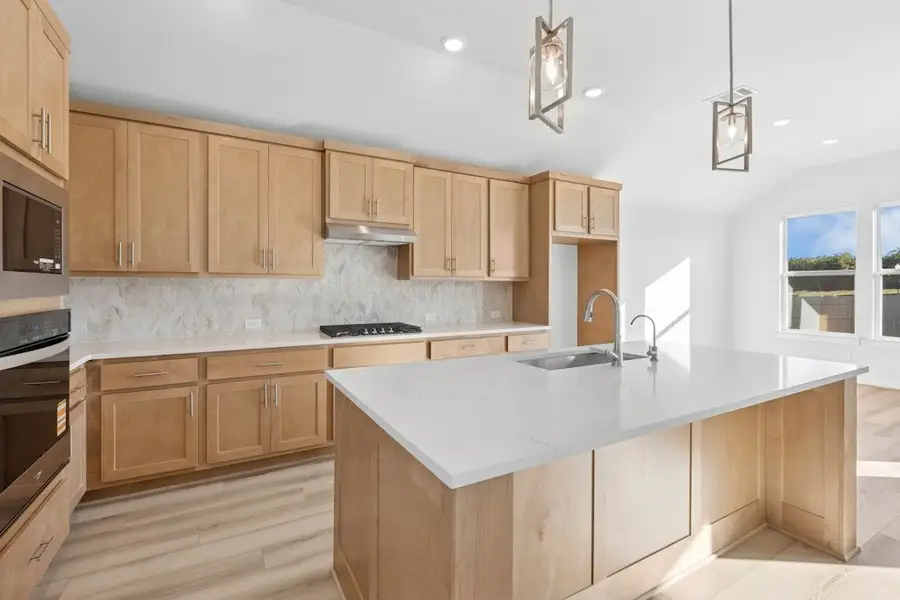 Furnished interior view inside a new home in The Colony, Bastrop (Image 6).