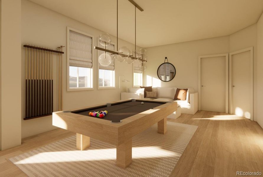 A rec room in the WALK-OUT basement provides ample space for games, fun, and lounging. *This is a 3D rendering.