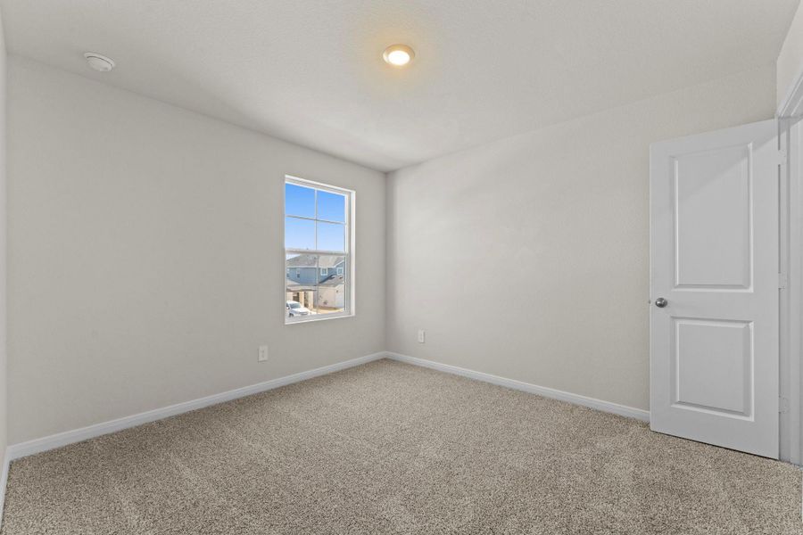 Spacious, unfurnished interior of a new home in Whisper South, San Marcos (Image 22).