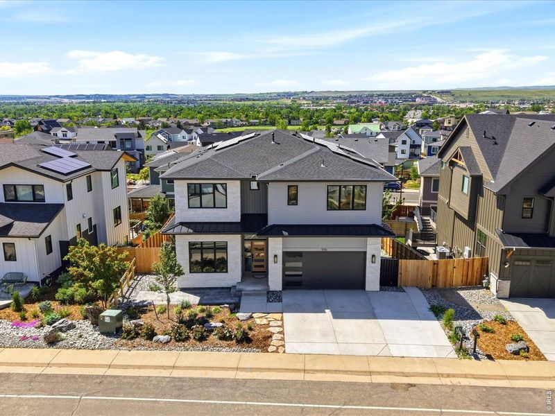 Front exterior of a new home in , Louisville, CO, highlighting curb appeal (Image 2).