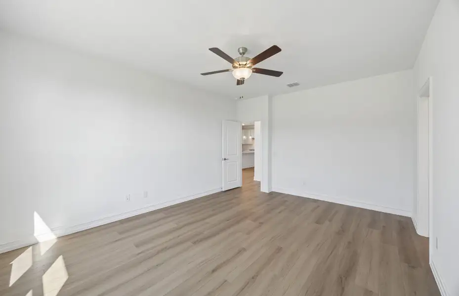 Spacious, unfurnished interior of a new home in Rosemary Fields, Godley (Image 16).