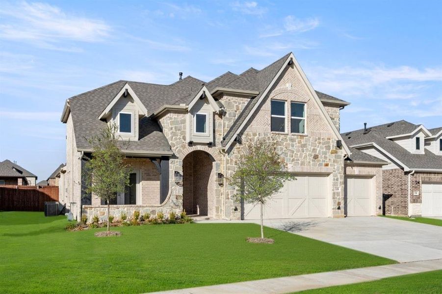 Front exterior of a new home in High Country, Burleson, TX, highlighting curb appeal (Image 21).