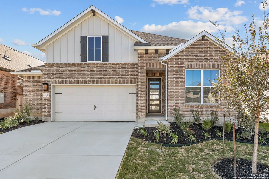 Front exterior of a new home in Mayfair 50', New Braunfels, TX, highlighting curb appeal (Image 24).