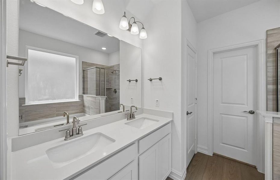 Owners bath with double vanities